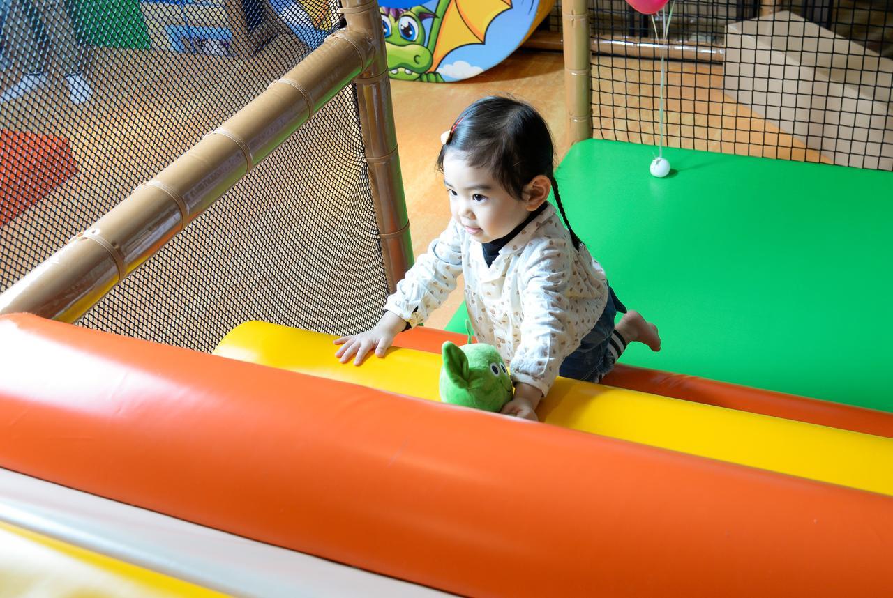 Cuncyue Hot Spring Resort Luodong Dış mekan fotoğraf A child playing at a playground